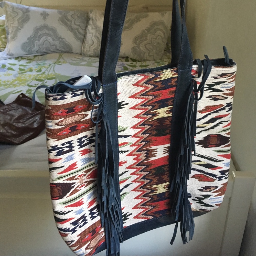 Kitson-bought bag and purse